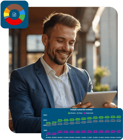 Jovem empresário sorridente analisando gráfico de Evolução mensal dos contratos no IXC Provedor Jovem empresário sorridente analisando gráfico de Evolução mensal dos contratos no IXC Provedor